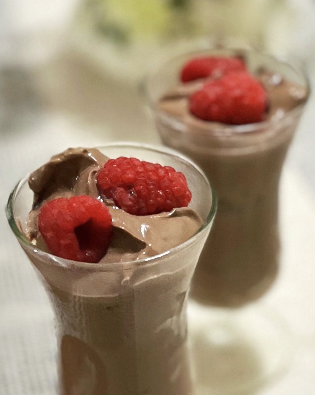 Plant-based chocolate mousse with raspberries